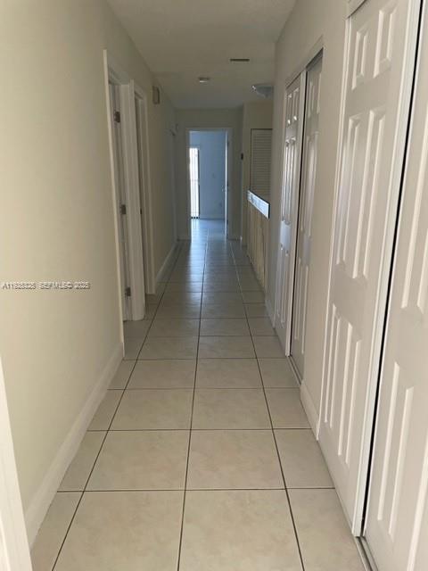 5631 West 28th Avenue, Unit 1 Hialeah, FL 33016 - Photo 7 of 18 a view of a hallway