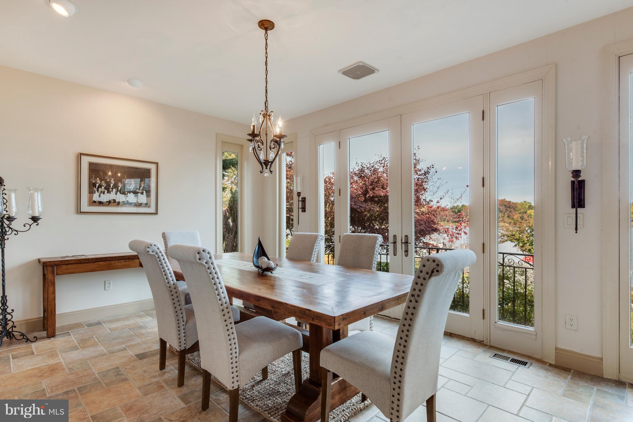 1795 Beachfield Road Annapolis, MD 21409 - Photo 24 of 49 a view of a dining room with furniture window and wooden floor