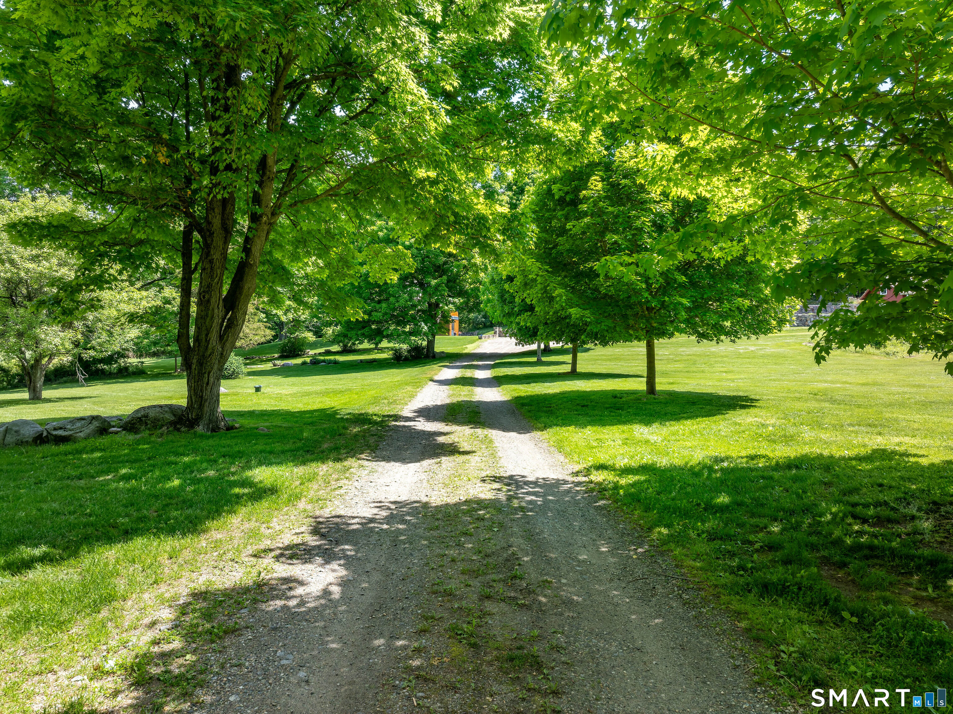 240 Umpawaug Road Redding, CT 06896 - Photo 38 of 40 The driveway. The home is ideally situated well-back from the road, nestled in the heart of the country compound.