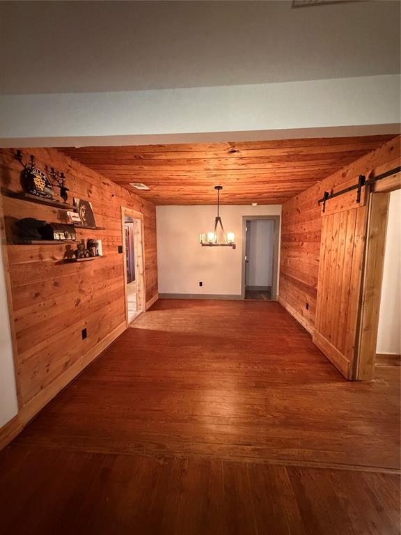1605 South Houston Street Kaufman, TX 75142 - Photo 14 of 27 a view of empty room with wooden floor