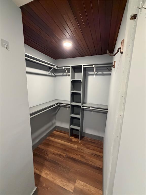 1605 South Houston Street Kaufman, TX 75142 - Photo 22 of 27 a view of walk in closet with empty racks