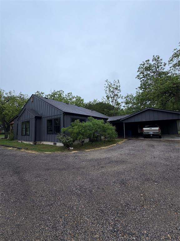 1605 South Houston Street Kaufman, TX 75142 - Photo 6 of 27 a view of a house with a yard