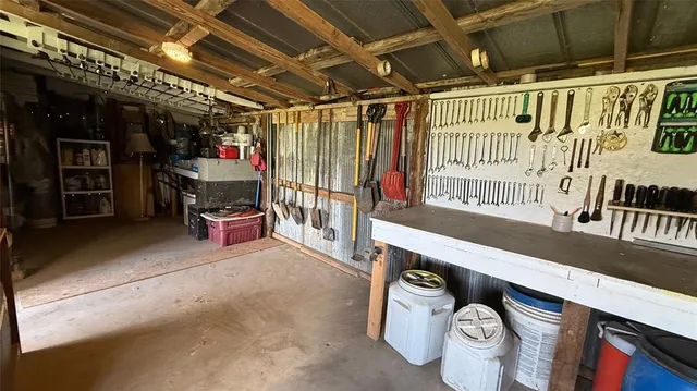 a view of a bench in middle of the garden