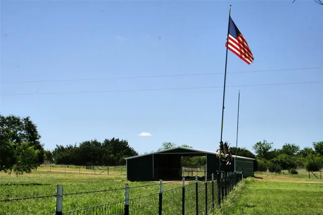 a view of a golf course with a lake
