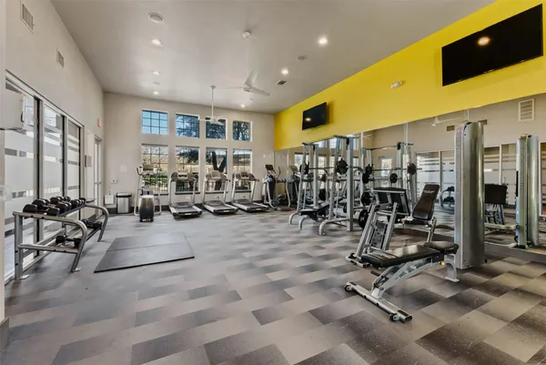 a view of a room with gym equipment