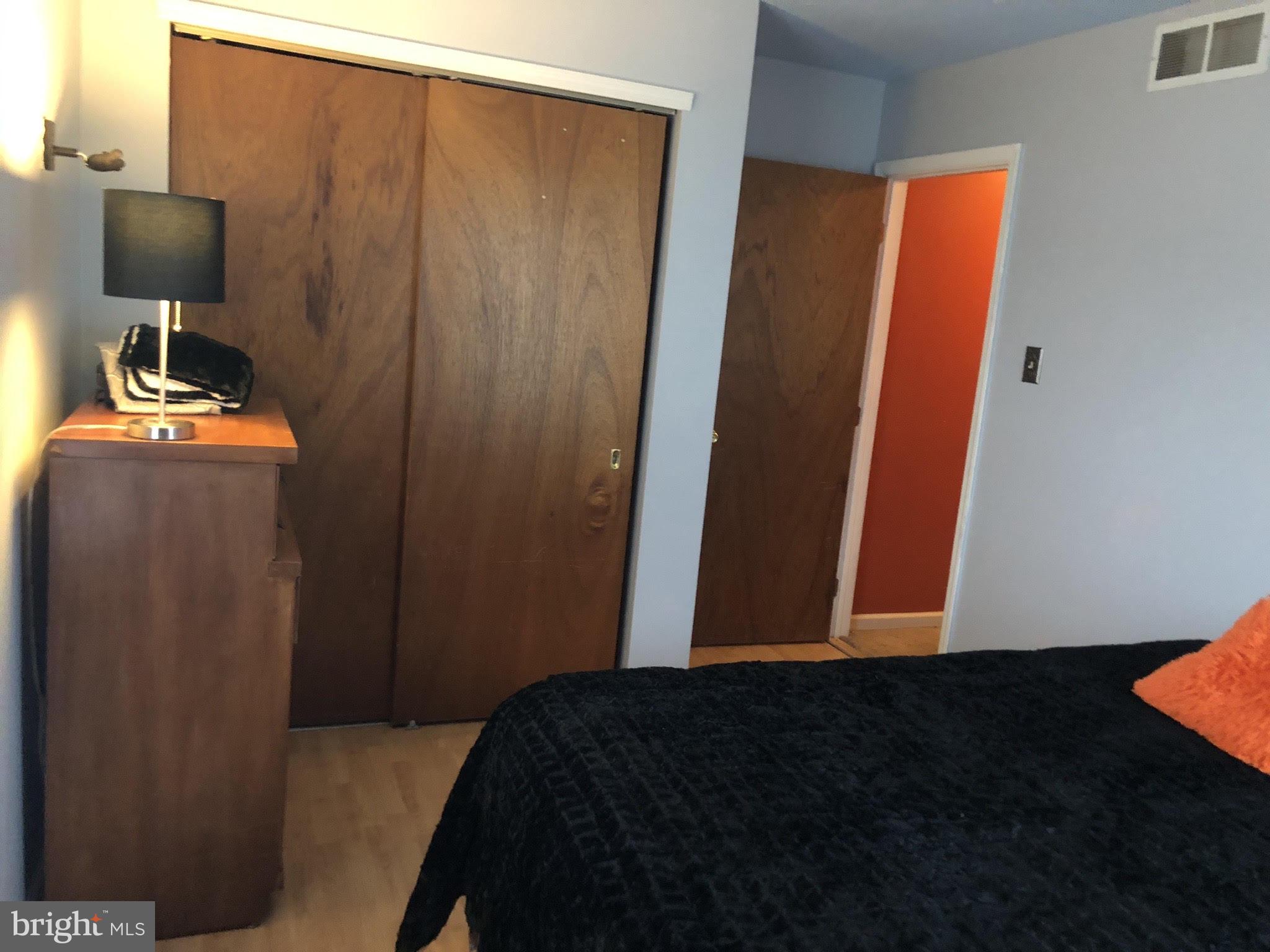 37 Winfield Road Sicklerville, NJ 08081 - Photo 22 of 32 a bedroom with a bed and cabinets