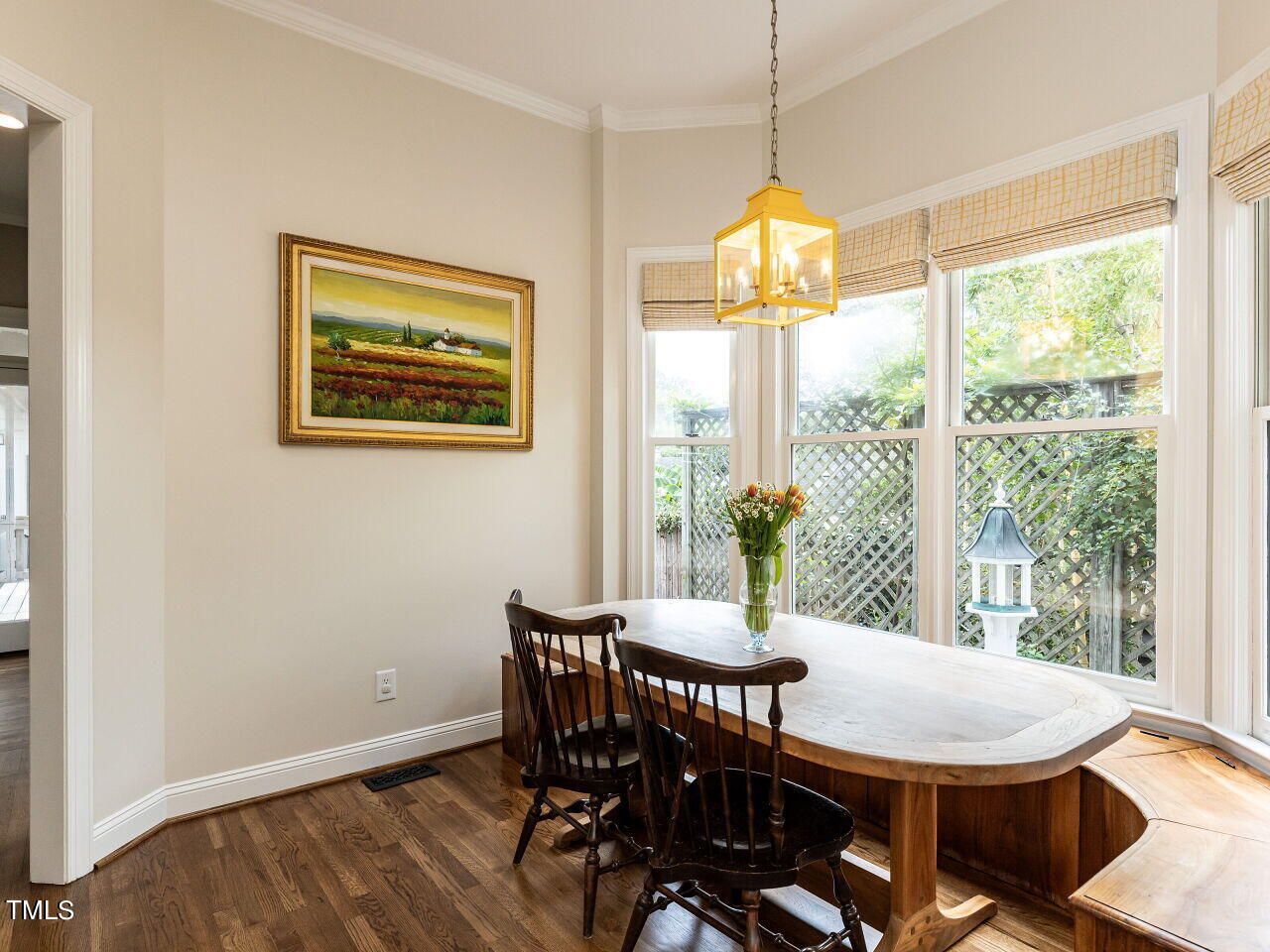 3108 Agecroft Road Raleigh, NC 27608 - Photo 19 of 42 a view of a dining room with furniture window and outside view