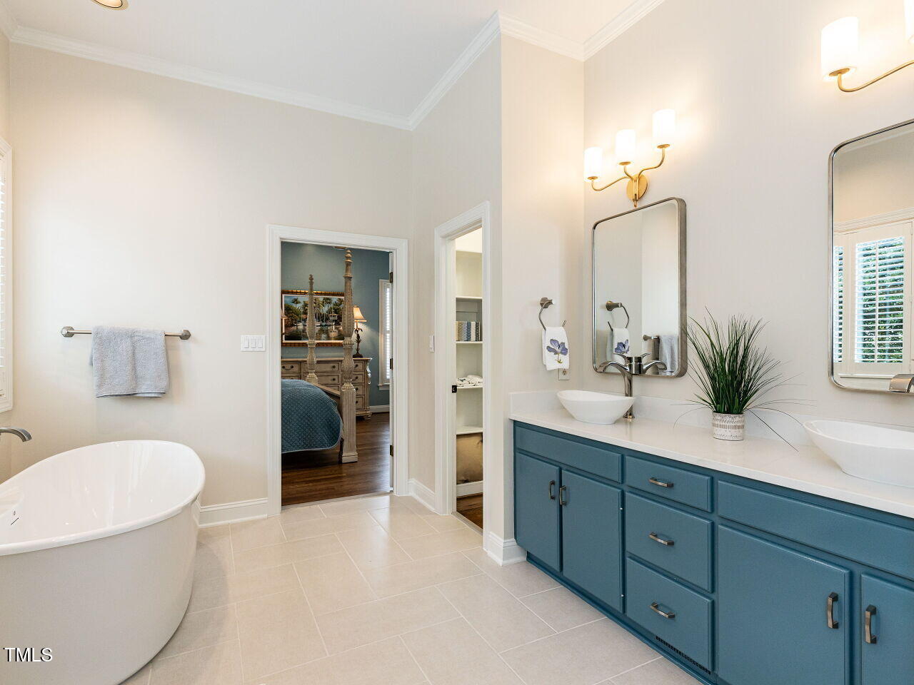 3108 Agecroft Road Raleigh, NC 27608 - Photo 22 of 42 a spacious bathroom with a granite countertop sink mirror and toilet