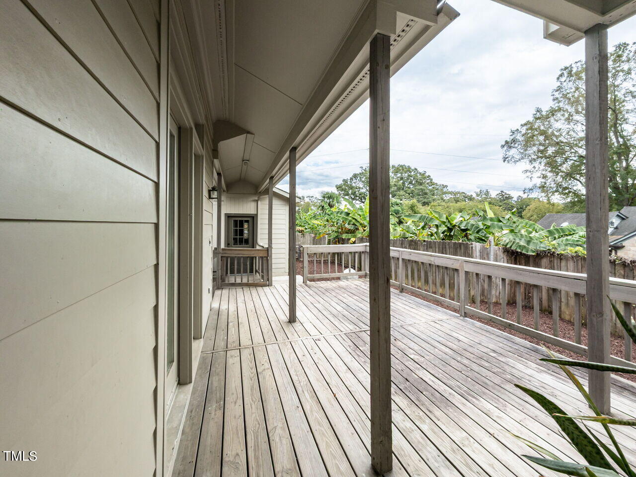 3108 Agecroft Road Raleigh, NC 27608 - Photo 36 of 42 a view of a balcony with wooden floor