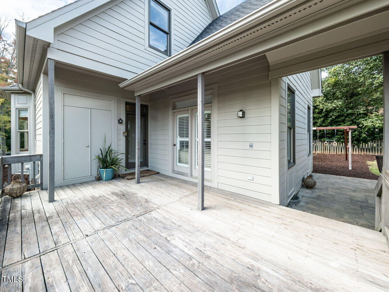 3108 Agecroft Road Raleigh, NC 27608 - Photo 38 of 42 a view of house with wooden floor and chair