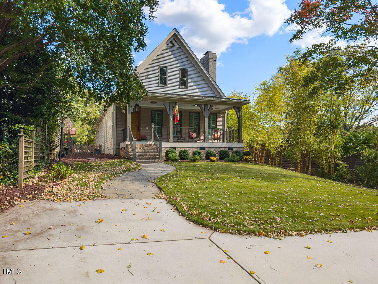 3108 Agecroft Road Raleigh, NC 27608 - Photo 41 of 42 a front view of a house with garden