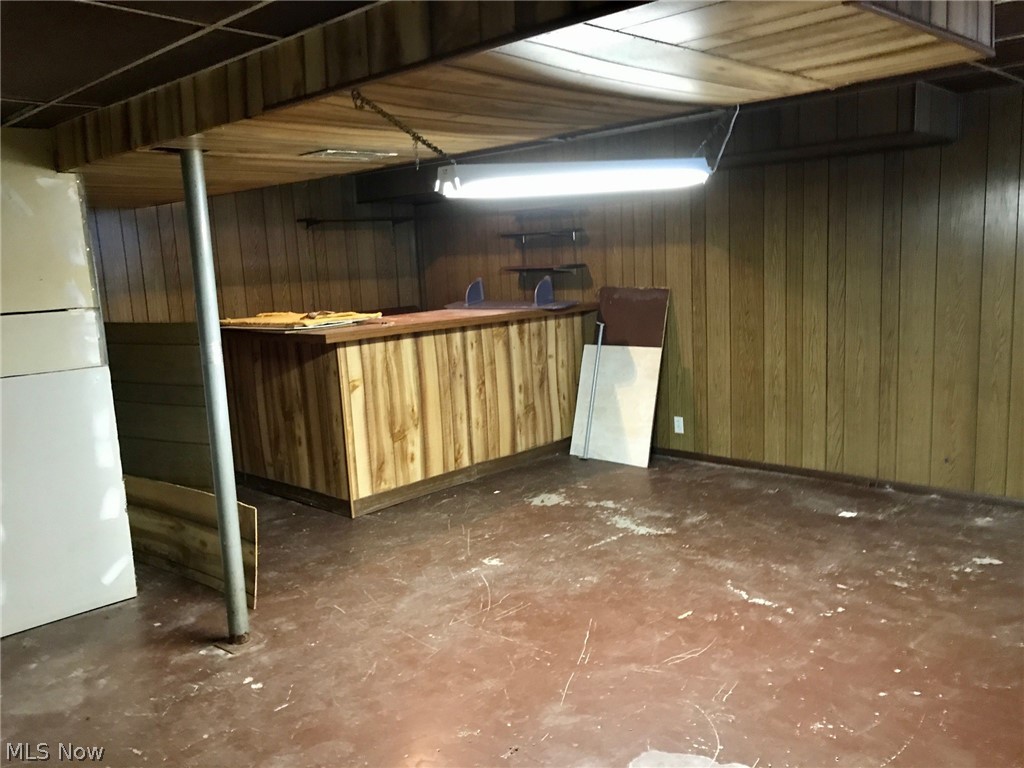 1884 Meadows Road Madison, OH 44057 - Photo 25 of 27 An "in-progress" bar room in basement waiting for your finishing touch!