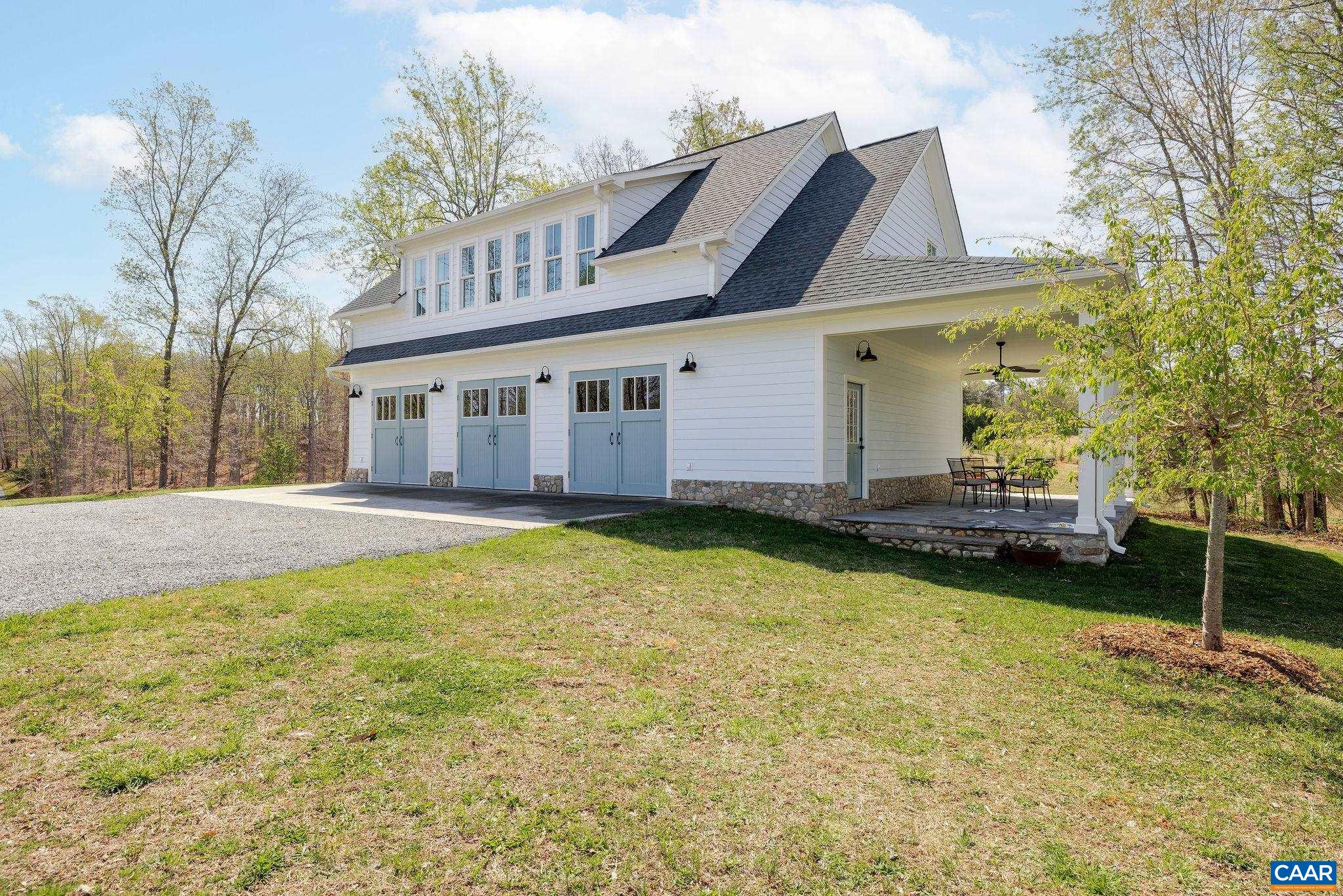 4764 Advance Mills Road Earlysville, VA 22936 - Photo 10 of 72 a view of a house with backyard and sitting area