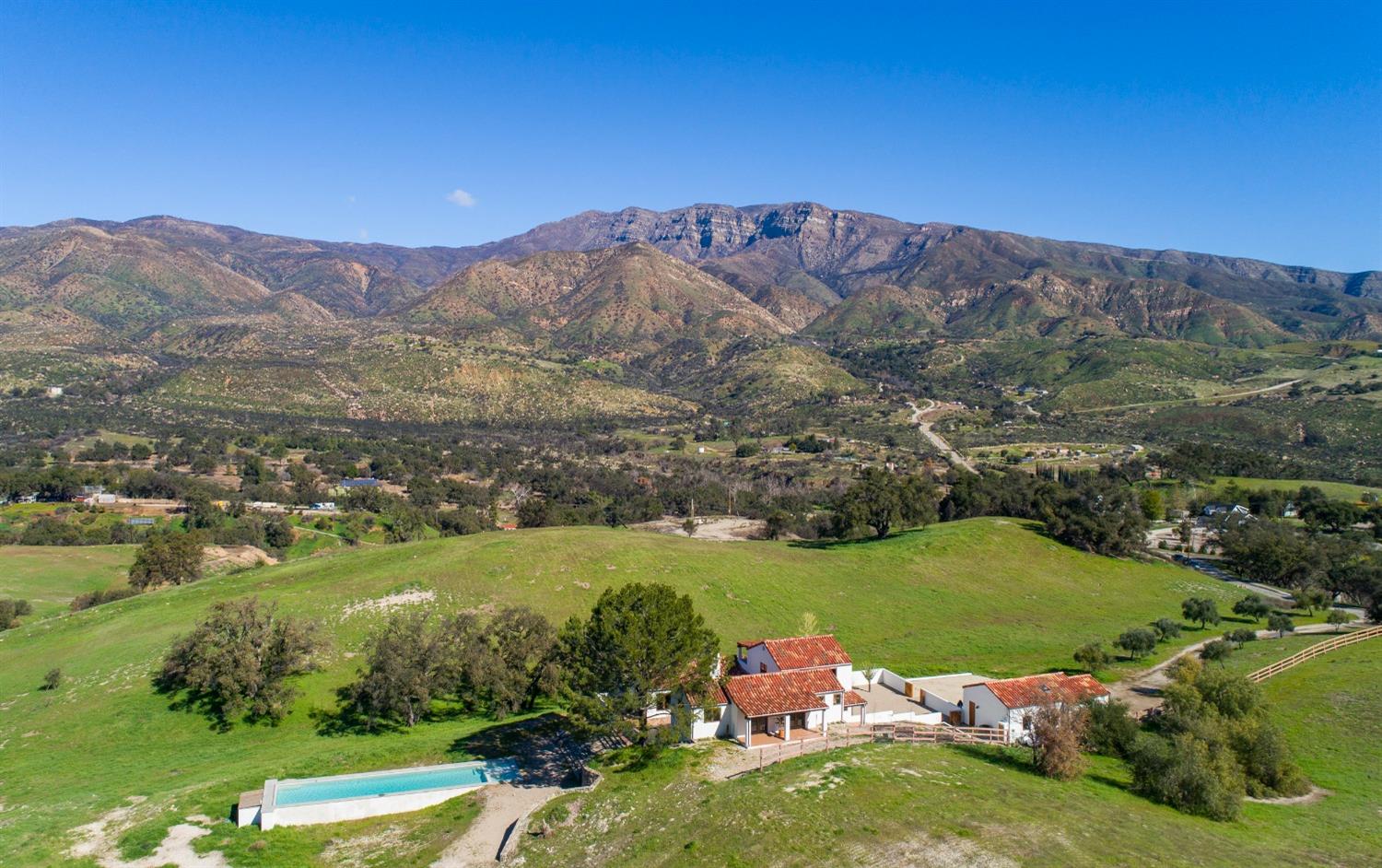 12980 Ojai Road Santa Paula, CA 93060 - Photo 1 of 38 an aerial view of a houses with a yard and lake view