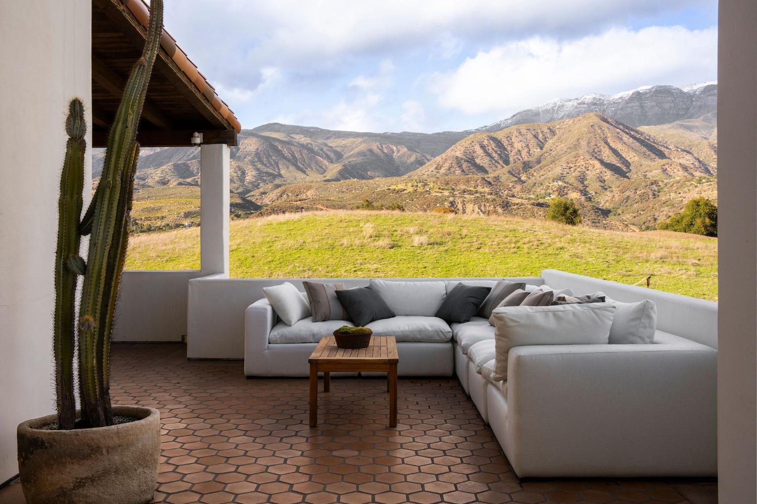 12980 Ojai Road Santa Paula, CA 93060 - Photo 11 of 38 a living room with furniture and a floor to ceiling window