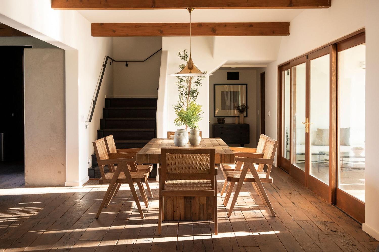 12980 Ojai Road Santa Paula, CA 93060 - Photo 12 of 38 a view of a dining room with furniture window and wooden floor