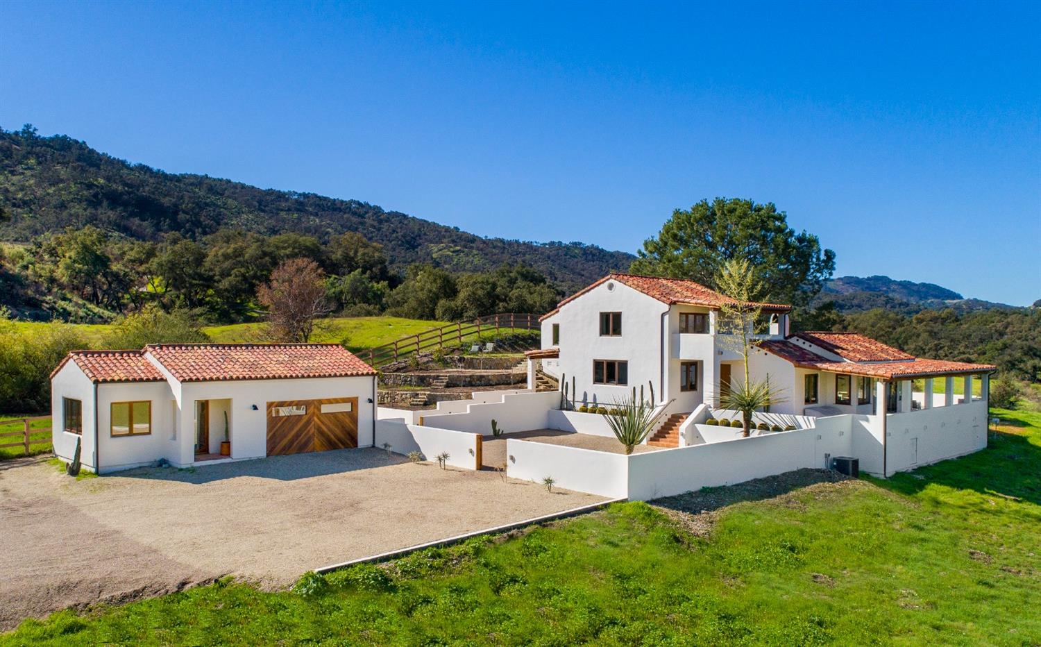 12980 Ojai Road Santa Paula, CA 93060 - Photo 2 of 38 a front view of a house with a yard