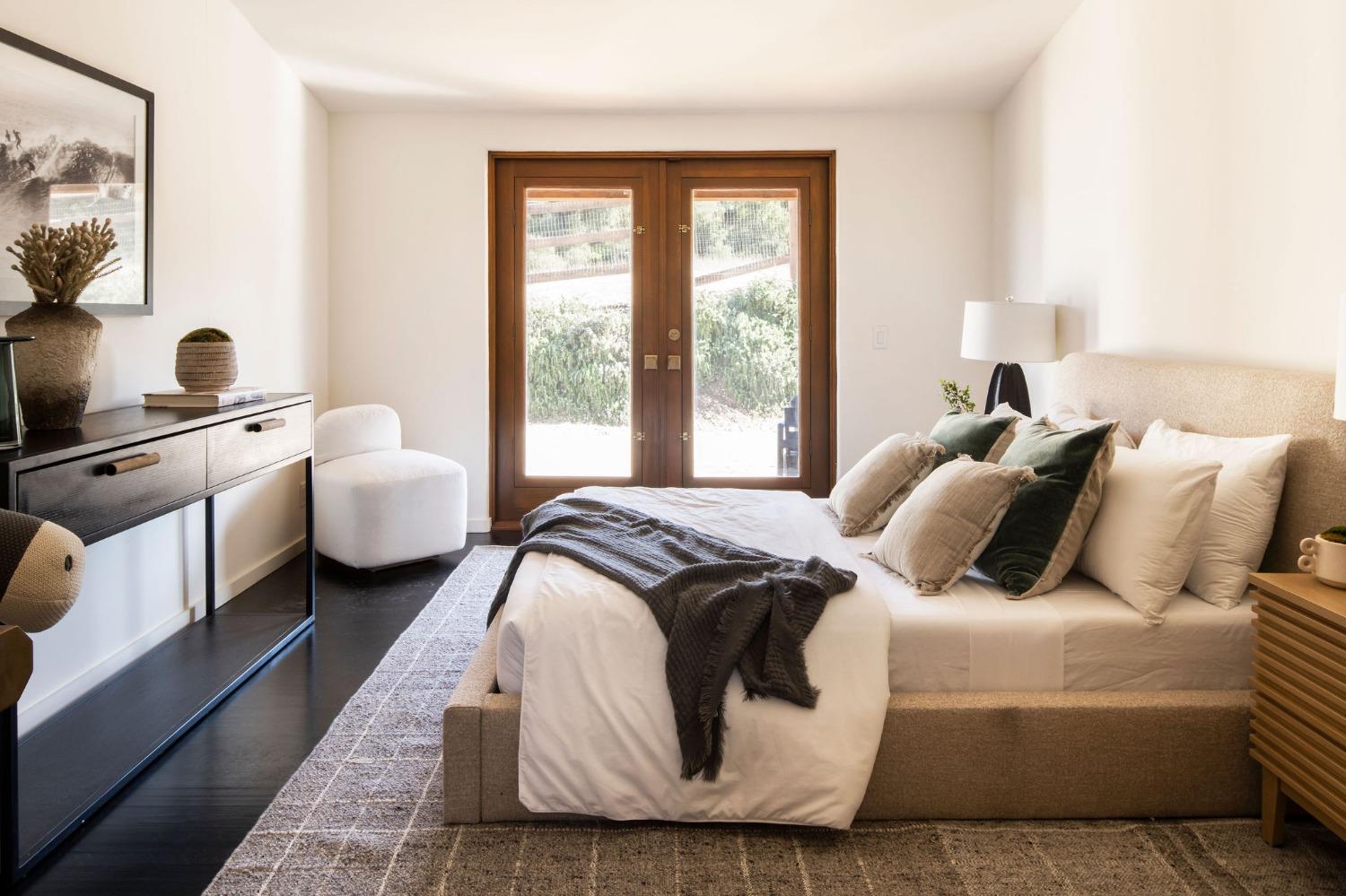 12980 Ojai Road Santa Paula, CA 93060 - Photo 28 of 38 a bedroom with a bed and a flat screen tv