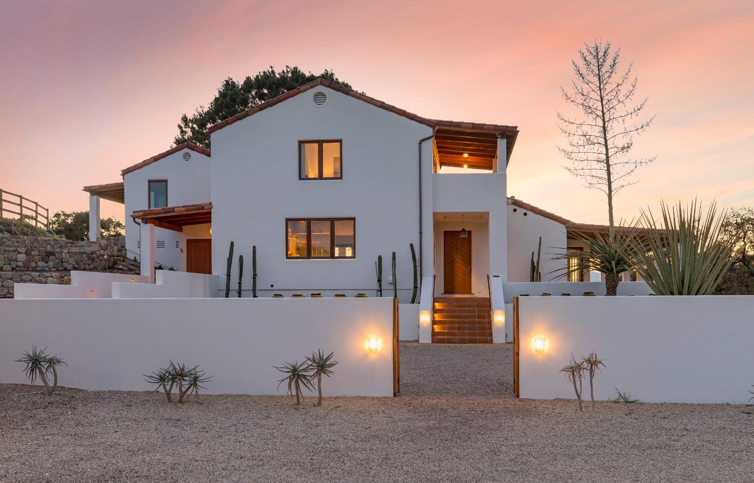 12980 Ojai Road Santa Paula, CA 93060 - Photo 3 of 38 a front view of a house with a yard