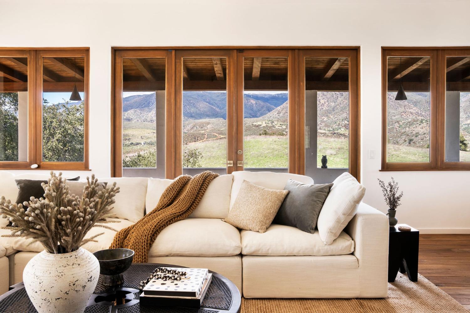12980 Ojai Road Santa Paula, CA 93060 - Photo 8 of 38 a living room with furniture and floor to ceiling windows