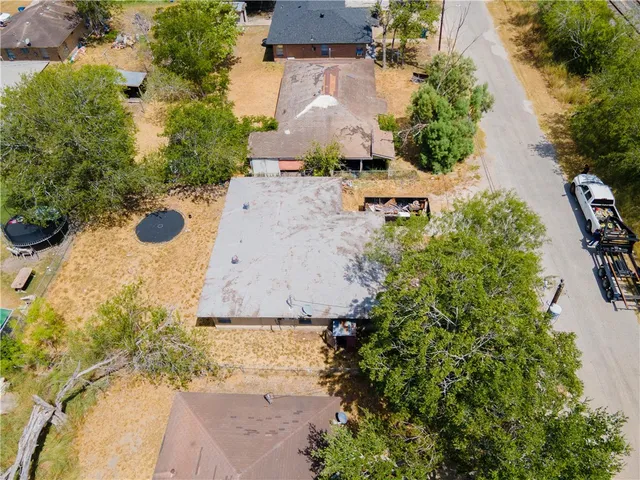 an aerial view of residential house with outdoor space