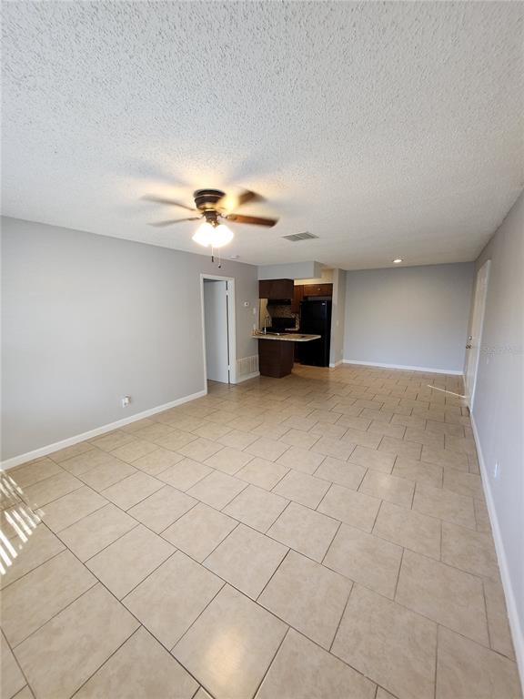 626 Golden Raintree Place, Unit 626 Brandon, FL 33510 - Photo 4 of 9 a view of empty room with fireplace
