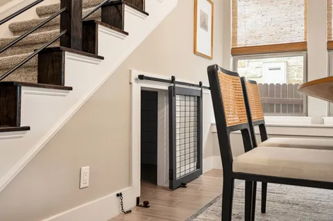a view of a dining room with furniture window and outside view