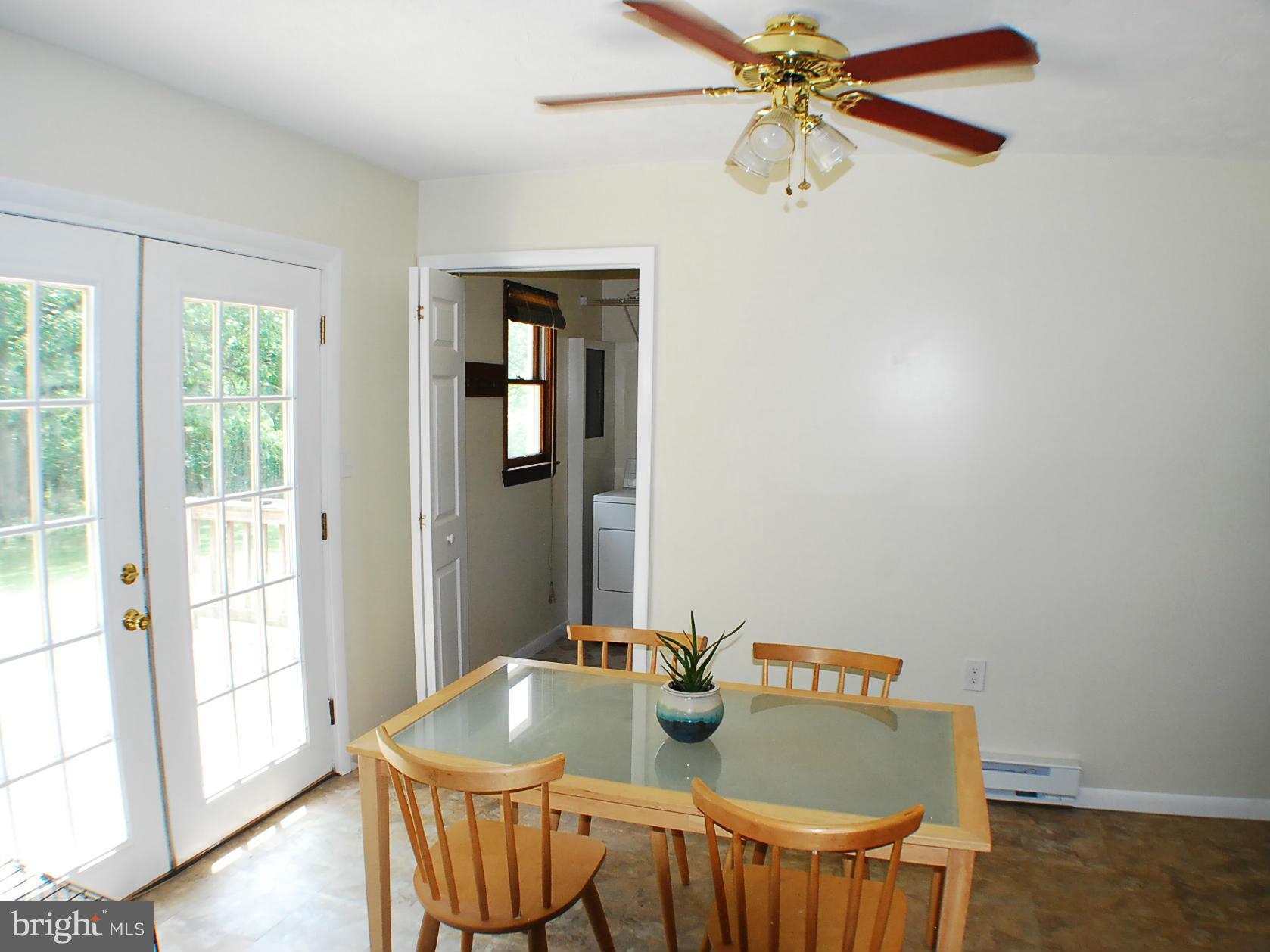 155 Fries Loop Road White Post, VA 22663 - Photo 13 of 29 a dining room with furniture and window