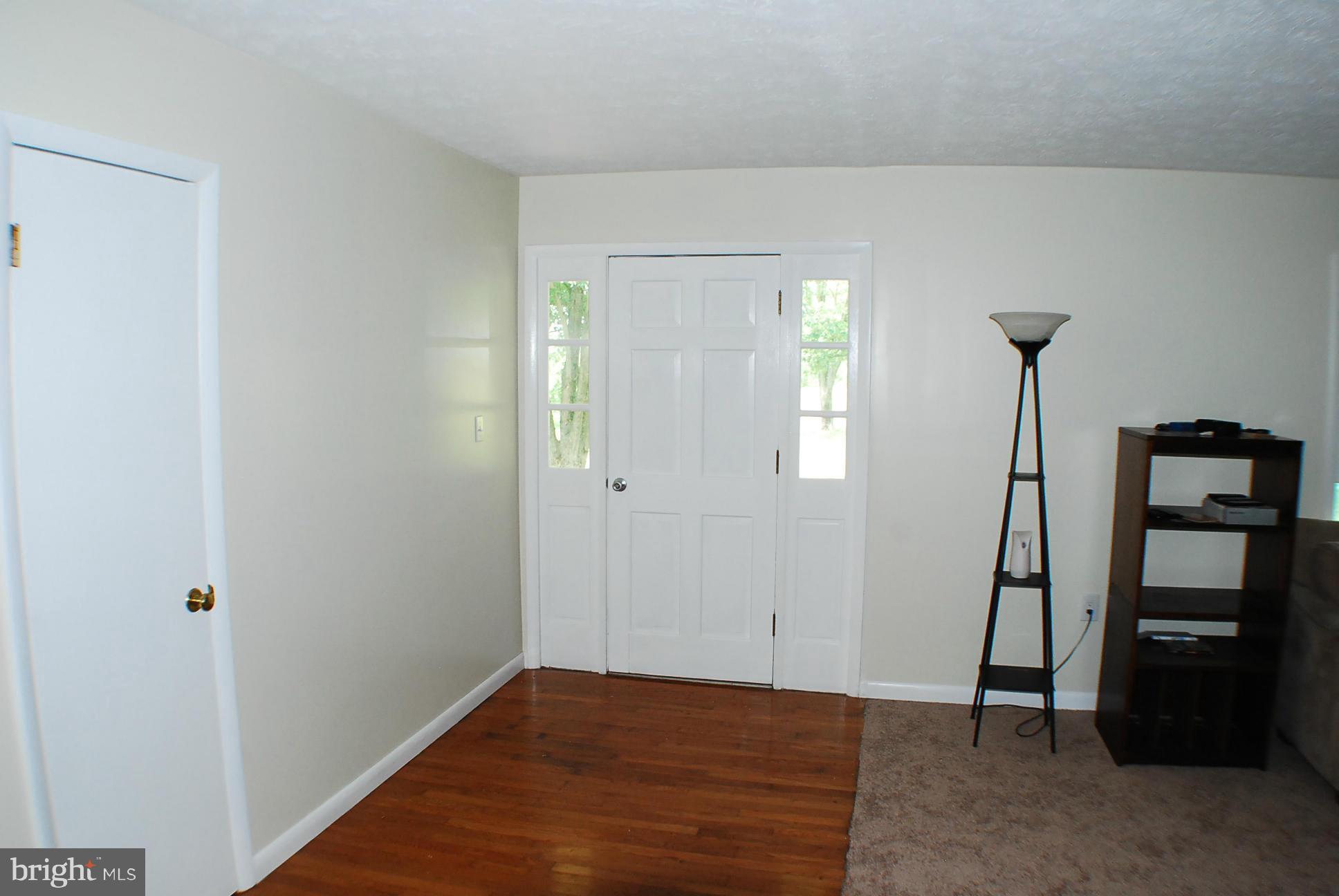 155 Fries Loop Road White Post, VA 22663 - Photo 8 of 29 a view of an empty room with closet and a window