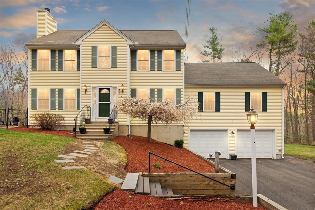 41 Chestnut Road Tyngsborough, MA 01879 - Photo 32 of 32 a view of a house with wooden floor and a yard