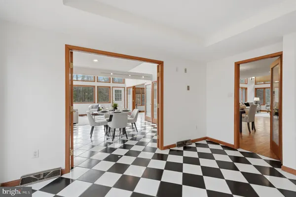 a living room with furniture and windows
