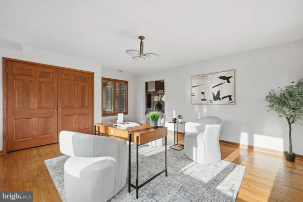 a kitchen with a stove sink and window