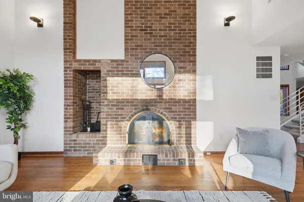 a view of an empty room with glass door and balcony