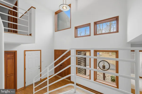 a view of entryway with wooden floor