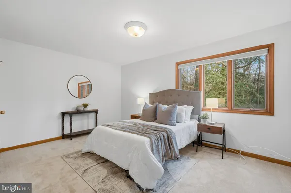 a kitchen with a cabinets and window