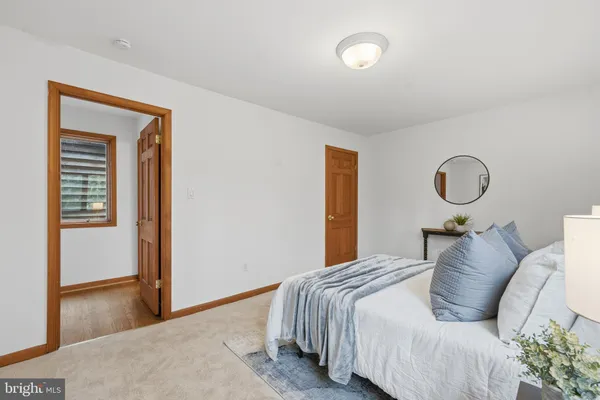 a kitchen with a sink a stove a refrigerator and cabinets