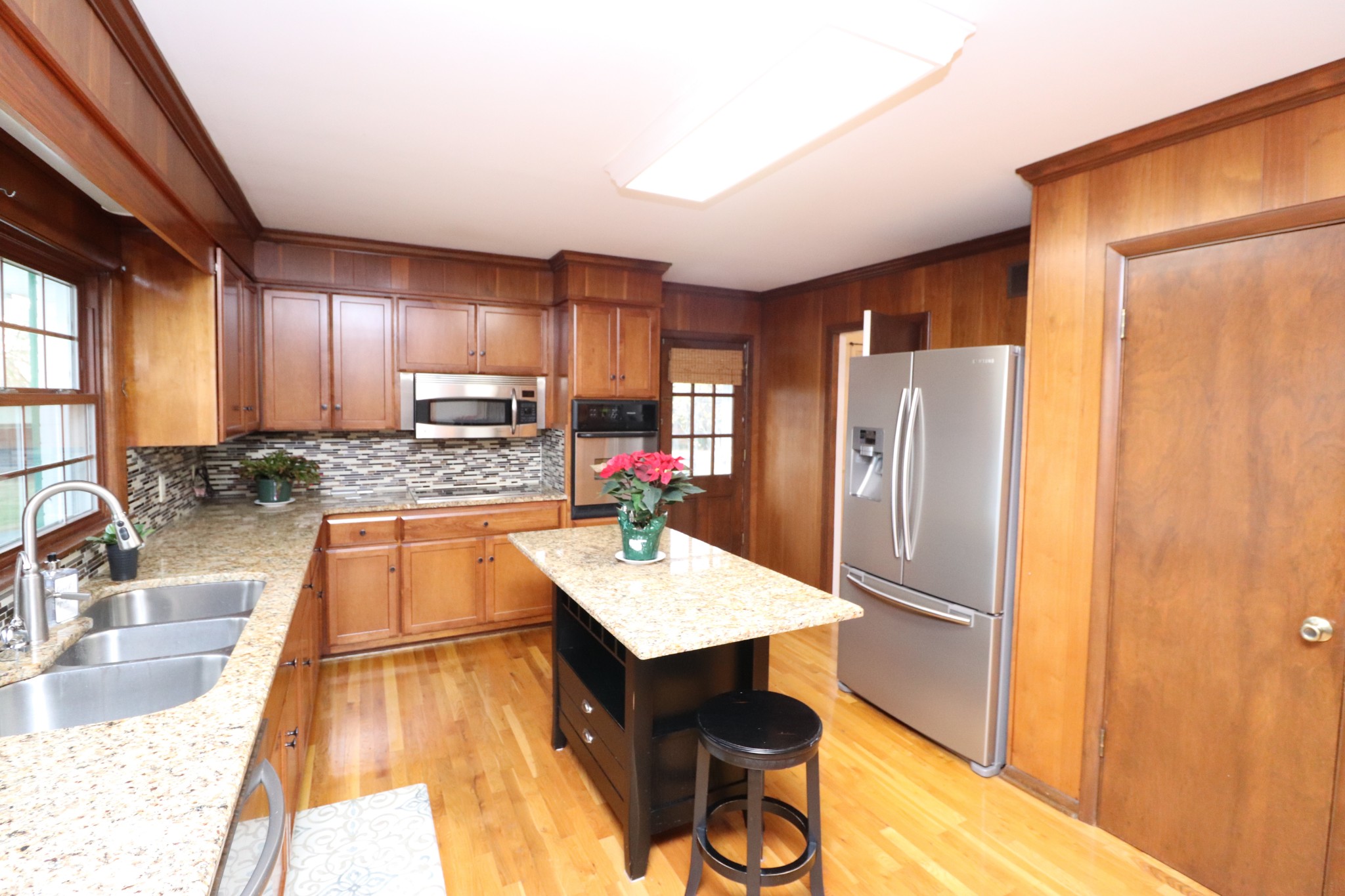 545 Puryears Bend Road Hartsville, TN 37074 - Photo 13 of 50 a kitchen with stainless steel appliances granite countertop a refrigerator sink and stove