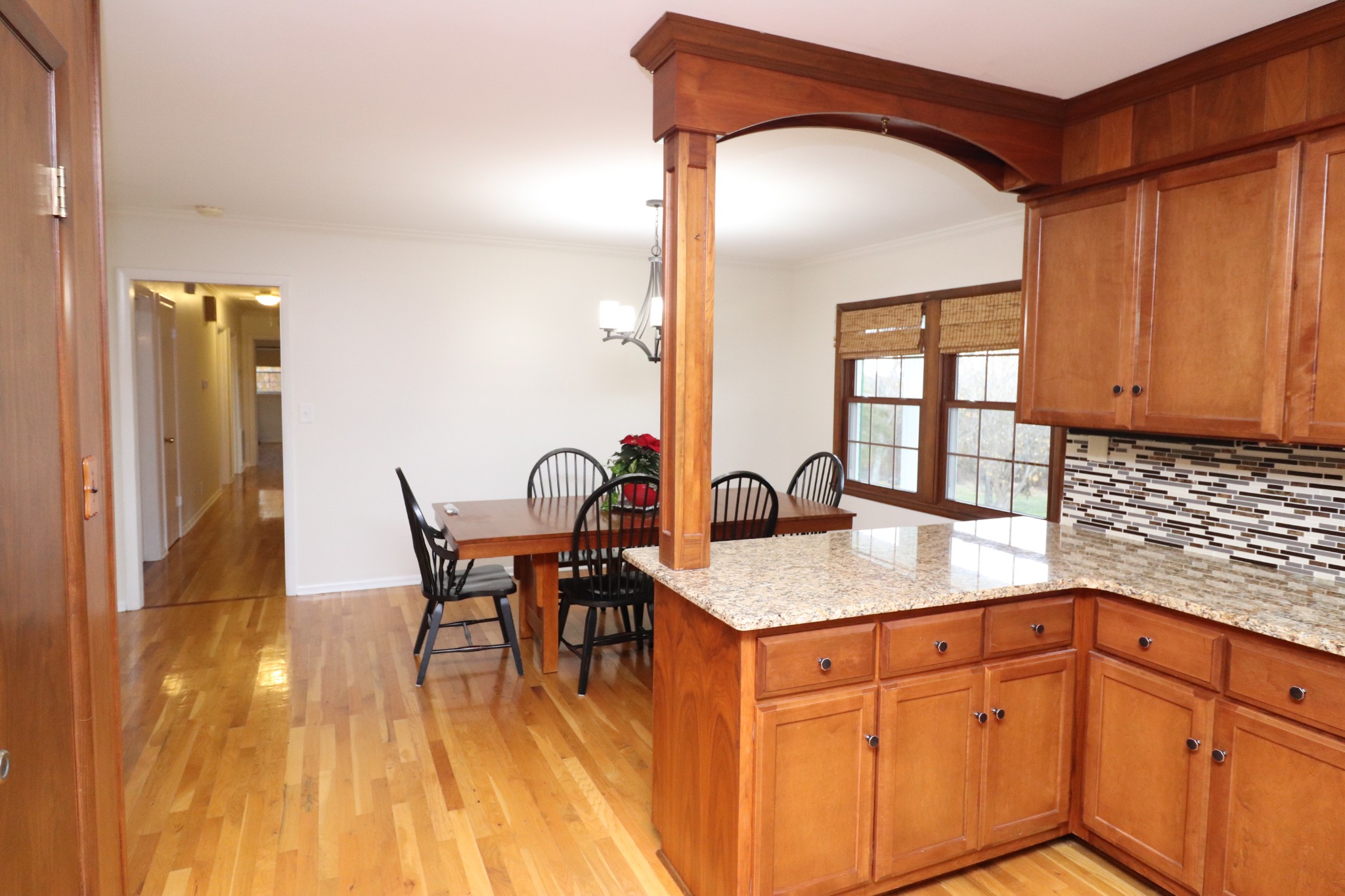 545 Puryears Bend Road Hartsville, TN 37074 - Photo 15 of 50 a kitchen with stainless steel appliances granite countertop a table chairs and a sink