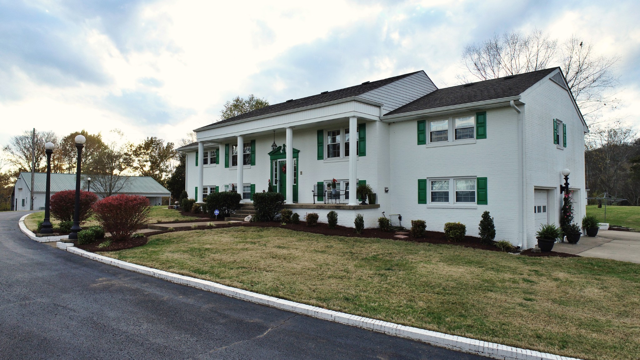 545 Puryears Bend Road Hartsville, TN 37074 - Photo 3 of 50 a view of a house with a big yard and large trees