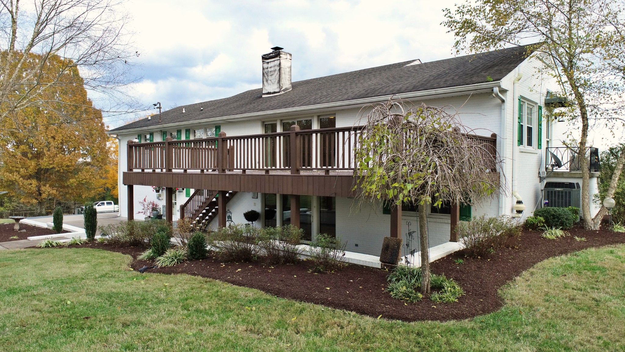 545 Puryears Bend Road Hartsville, TN 37074 - Photo 40 of 50 a front view of a house with garden