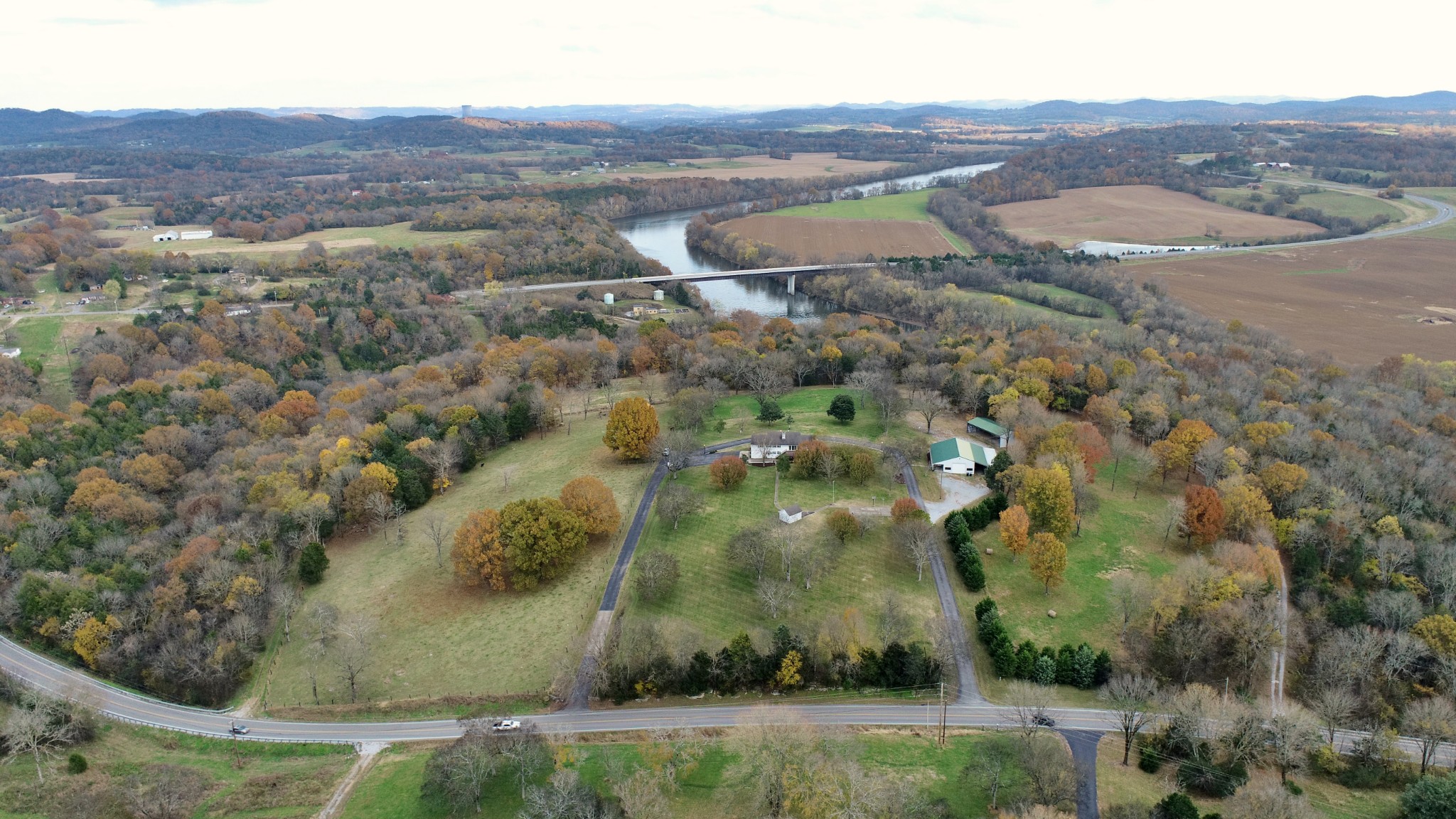 545 Puryears Bend Road Hartsville, TN 37074 - Photo 47 of 50 an aerial view of residential houses with outdoor space and trees