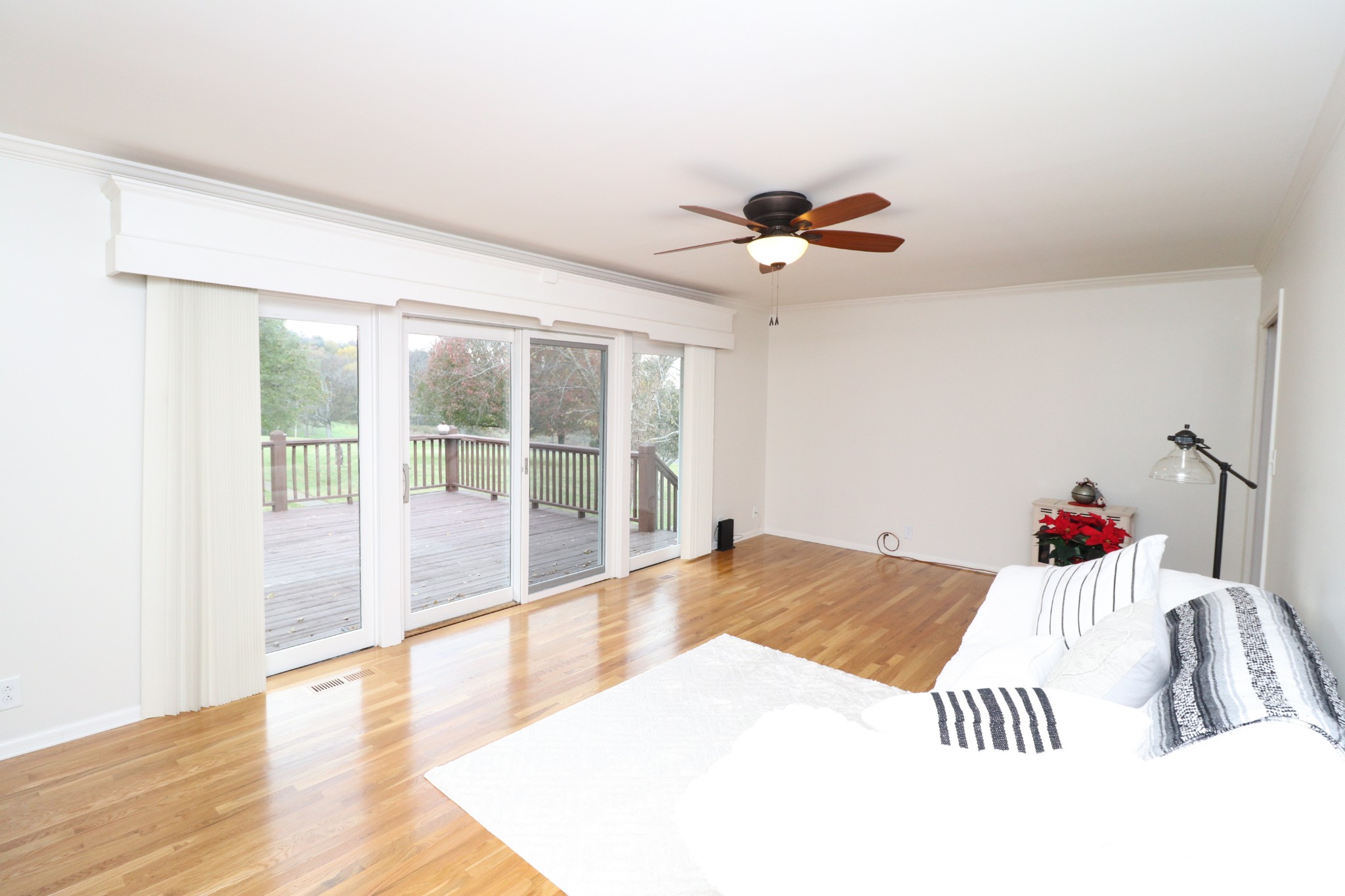 545 Puryears Bend Road Hartsville, TN 37074 - Photo 7 of 50 a view of a bedroom with a bed and wooden floor