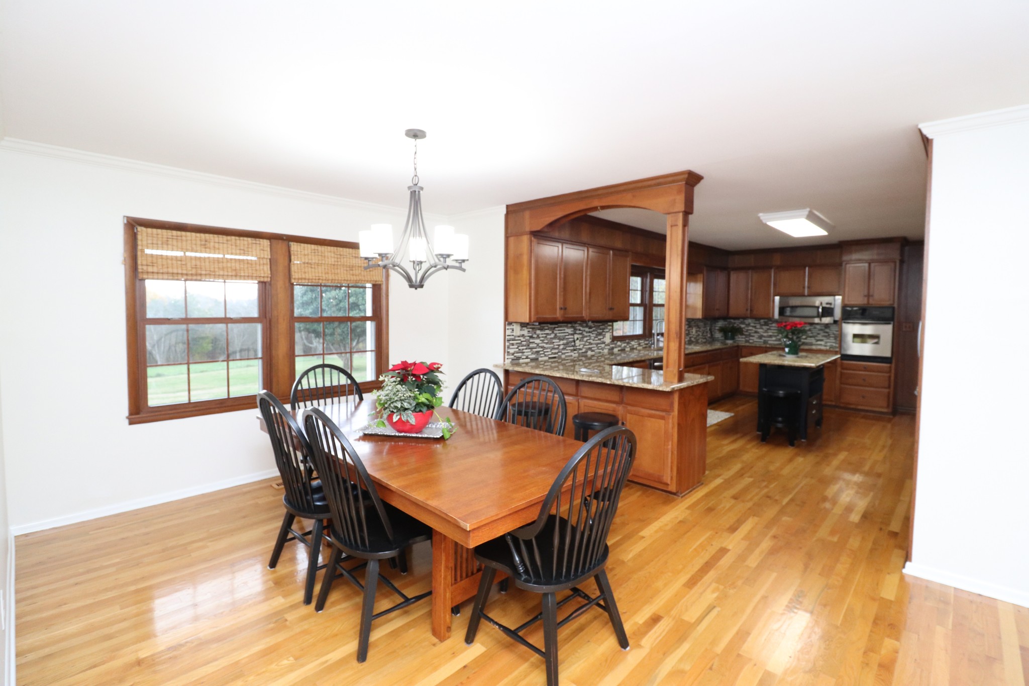 545 Puryears Bend Road Hartsville, TN 37074 - Photo 8 of 50 a view of a dining room with furniture and a kitchen