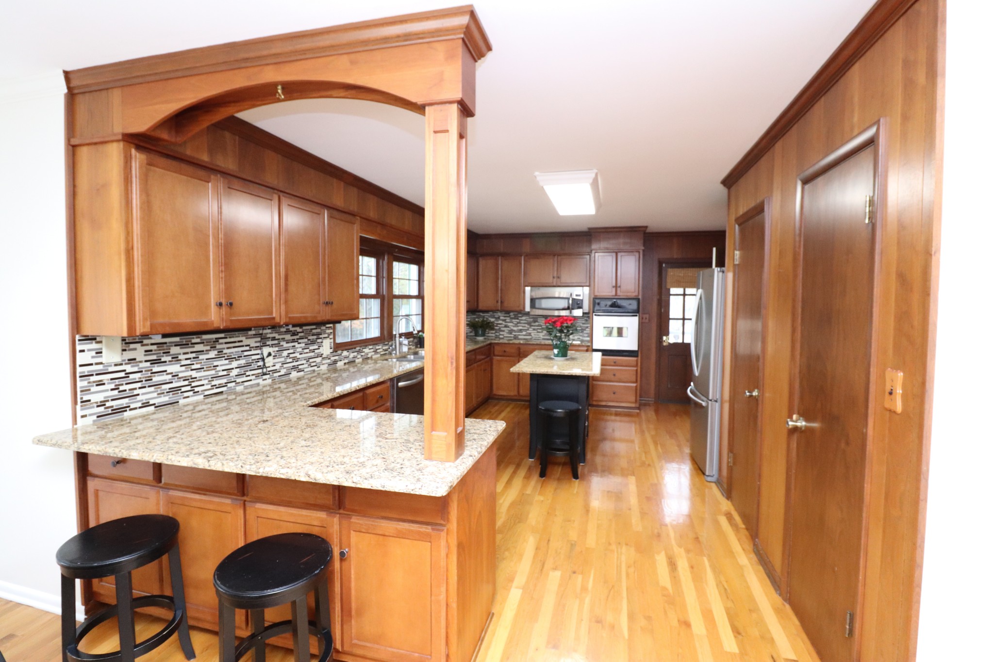 545 Puryears Bend Road Hartsville, TN 37074 - Photo 10 of 50 a kitchen with stainless steel appliances granite countertop a sink and cabinets