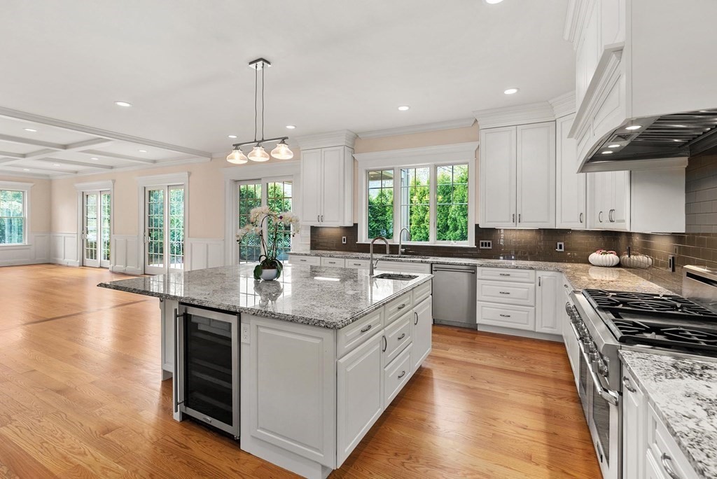 53 Van Roosen Road Newton, MA 02459 - Photo 12 of 34 a kitchen with stainless steel appliances granite countertop a stove and a sink