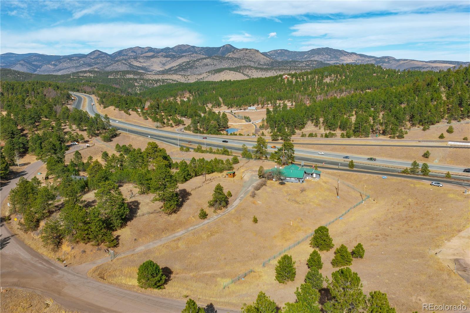 29793 Ruby Ranch Road Evergreen, CO 80439 - Photo 11 of 39 a view of lake and mountain