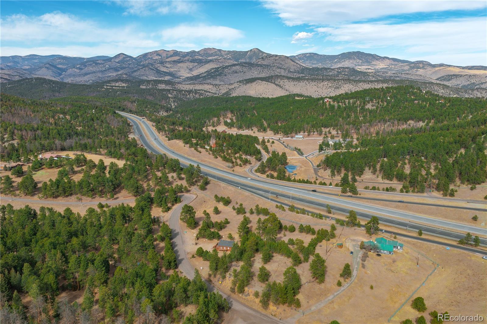 29793 Ruby Ranch Road Evergreen, CO 80439 - Photo 20 of 39 a view of a city from a balcony
