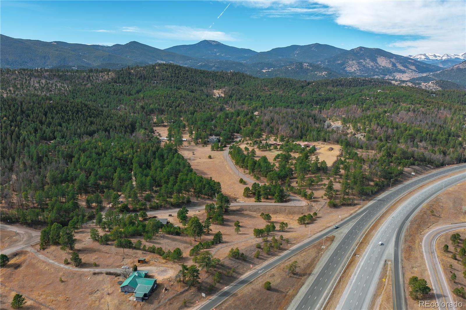 29793 Ruby Ranch Road Evergreen, CO 80439 - Photo 22 of 39 a view of a mountain with a outdoor