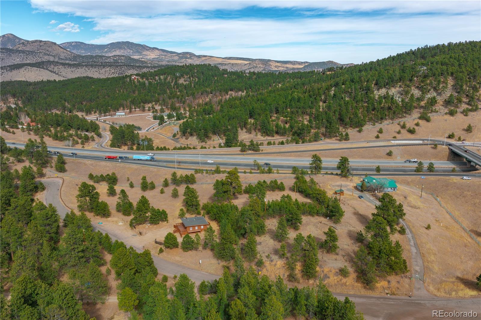 29793 Ruby Ranch Road Evergreen, CO 80439 - Photo 28 of 39 a view of lake with mountain