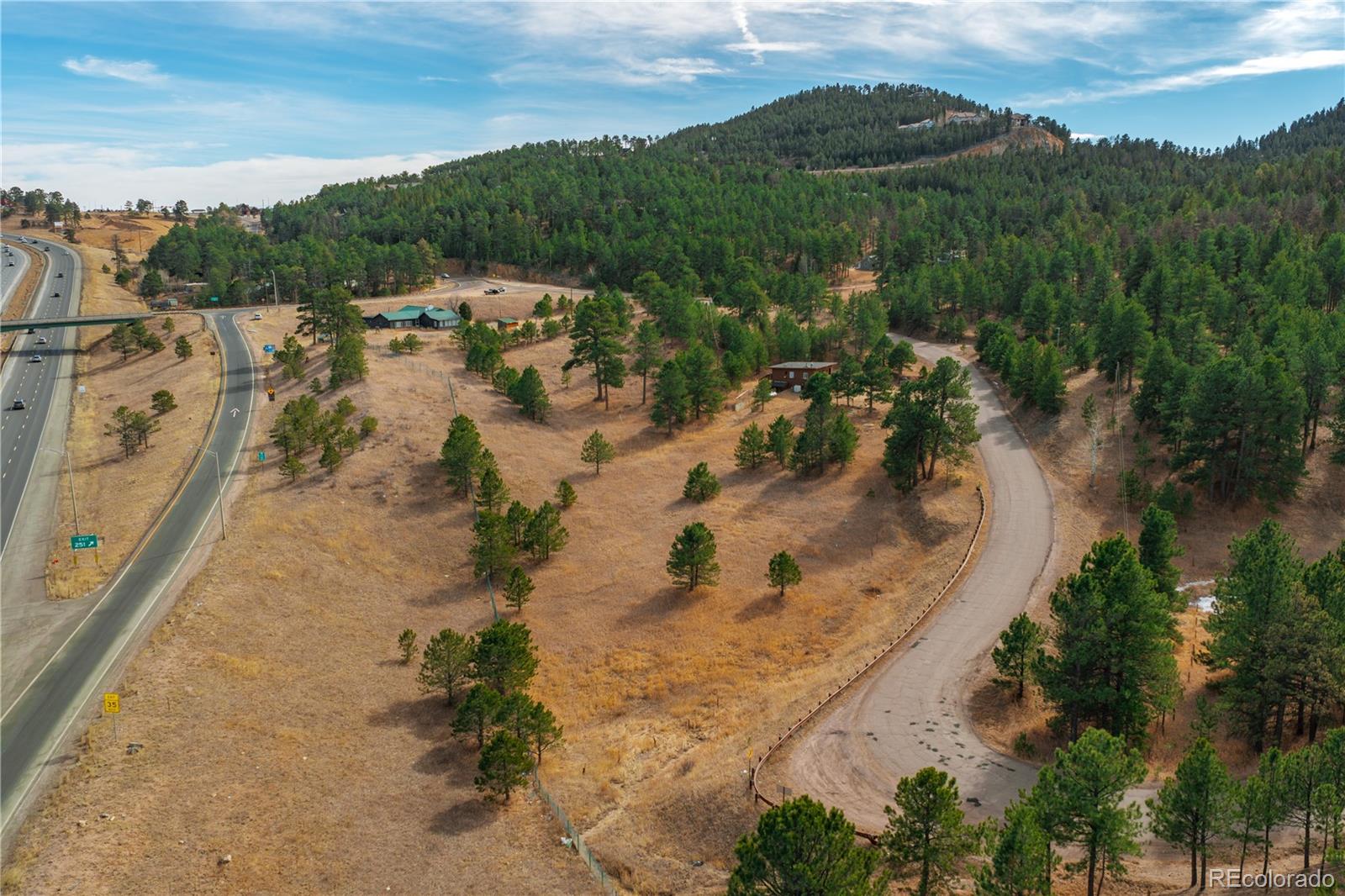 29793 Ruby Ranch Road Evergreen, CO 80439 - Photo 30 of 39 an aerial view of residential houses with outdoor space